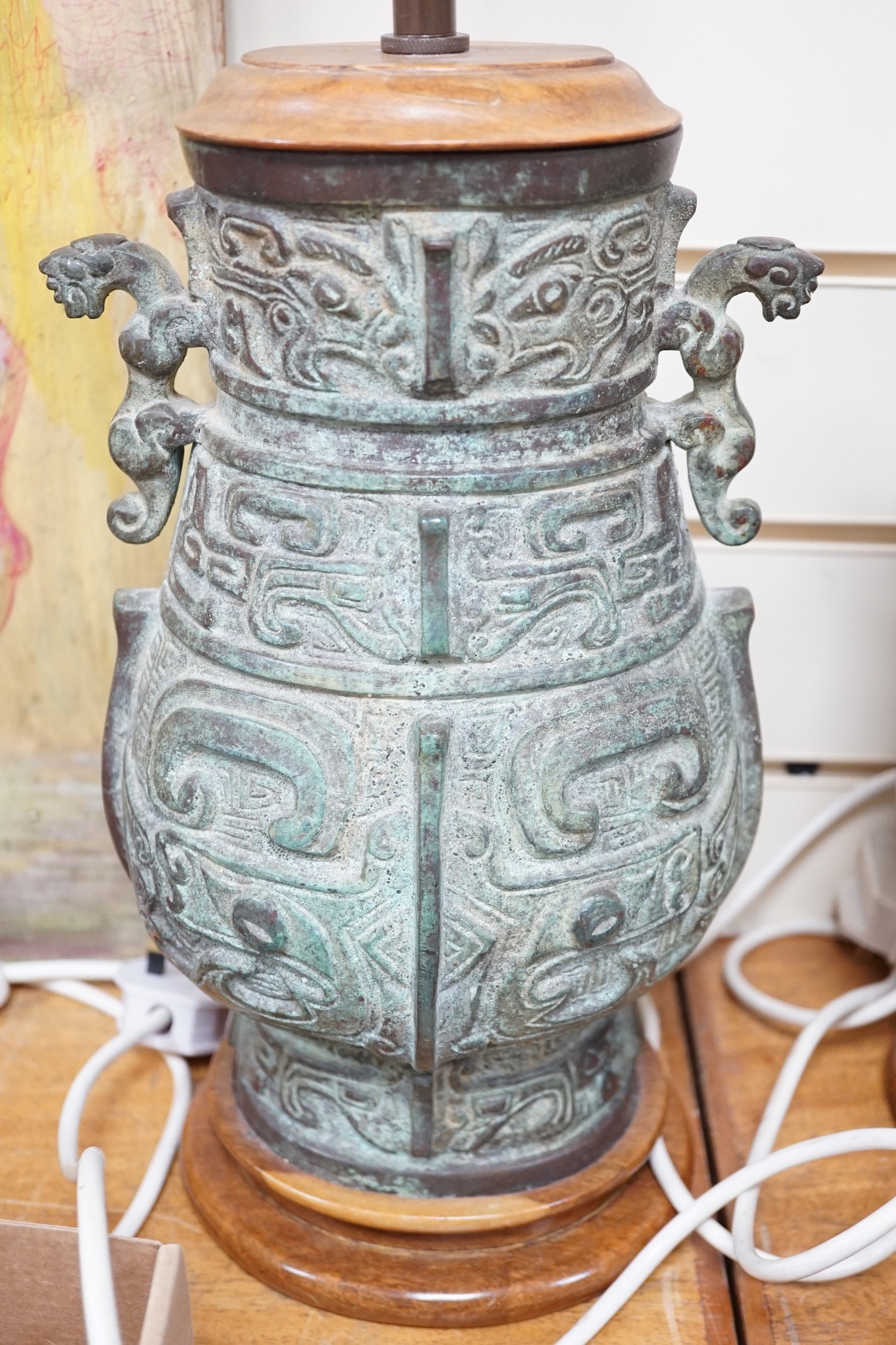 A pair of Chinese archaistic bronze ‘hu’ telescopic table lamps
